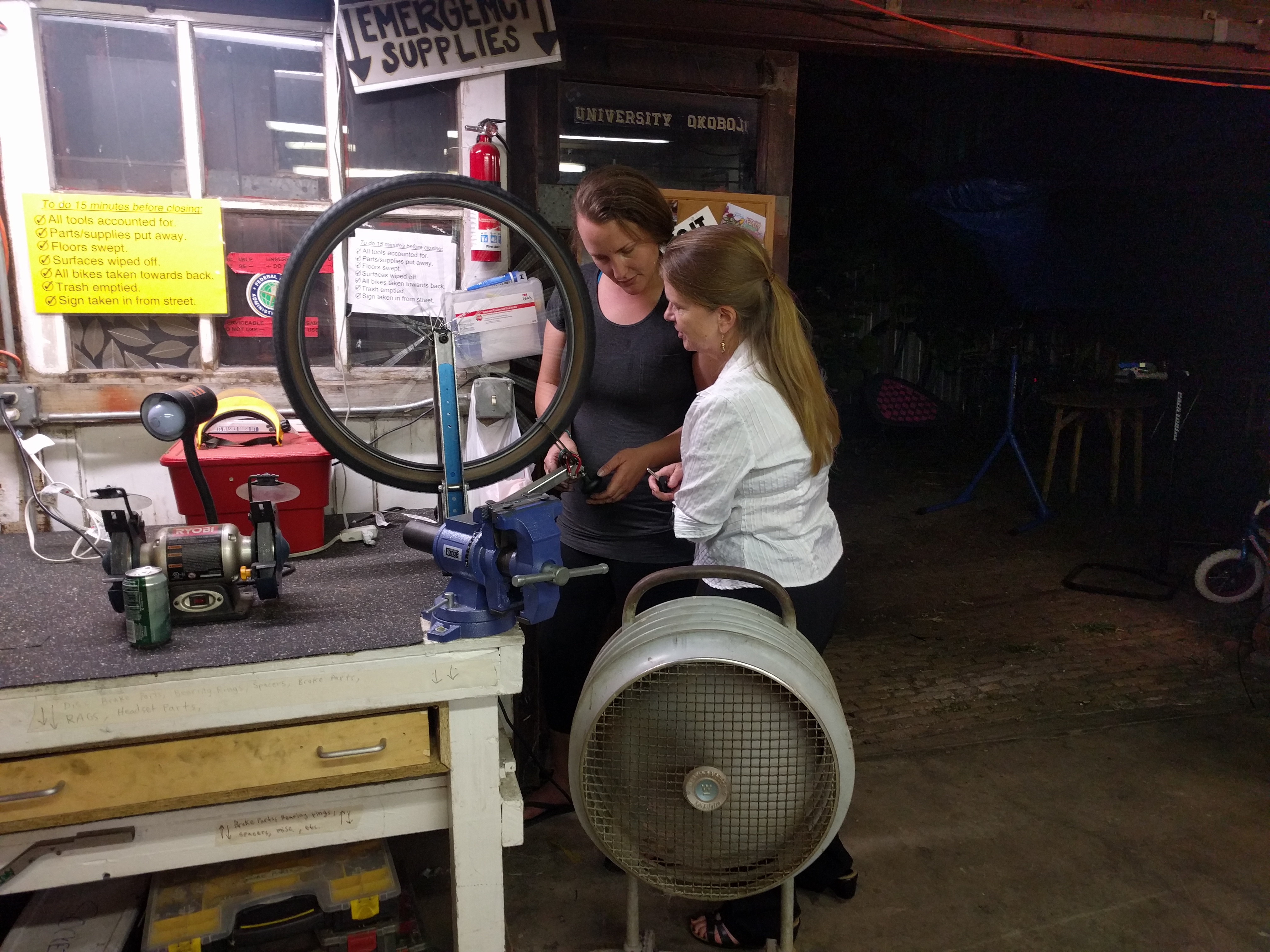 Desiree Kuhn, discussing truing wheels with Jane Halliday